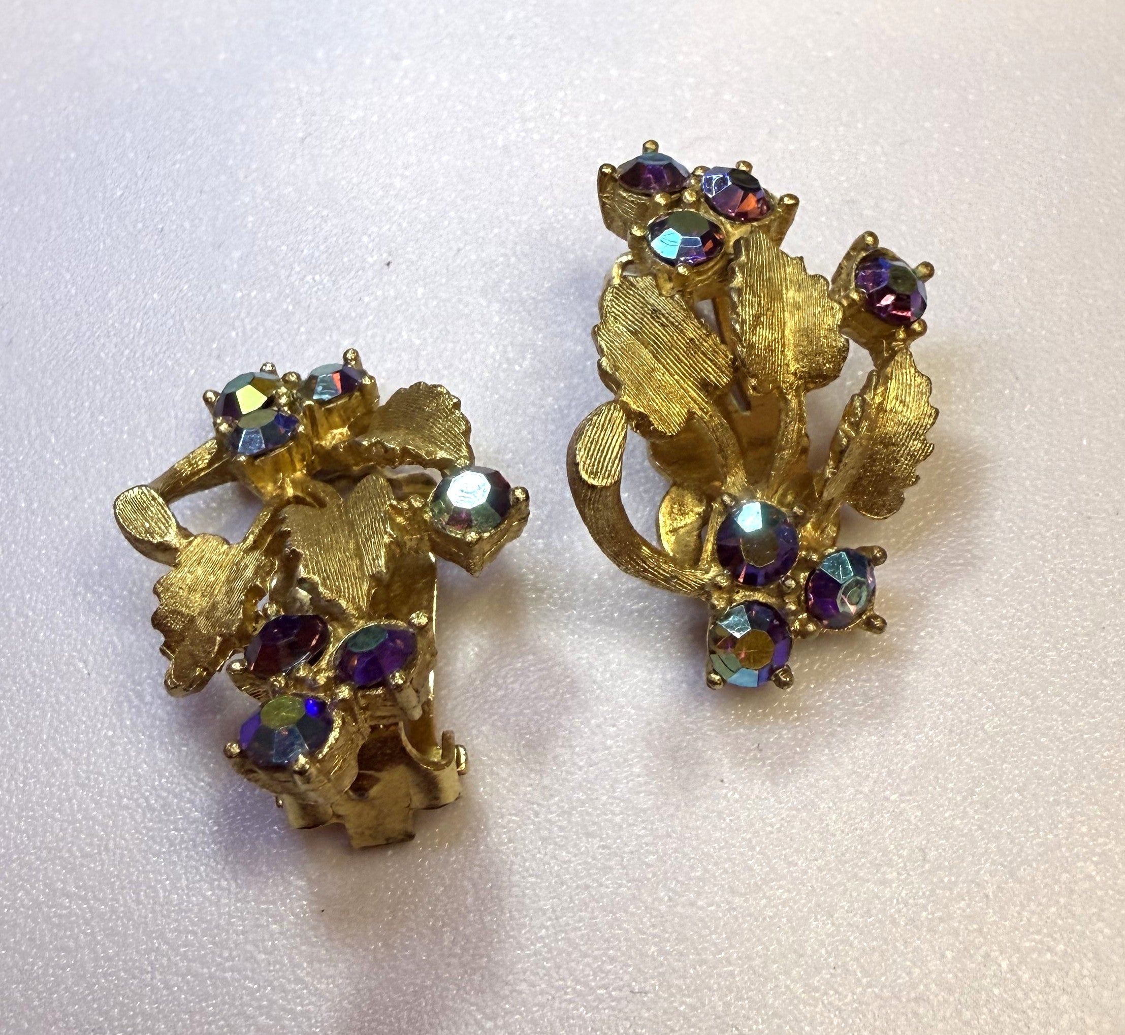 1940s Gold Tone Leaf Clip-On Earrings with Purple Aurora Borealis Stones