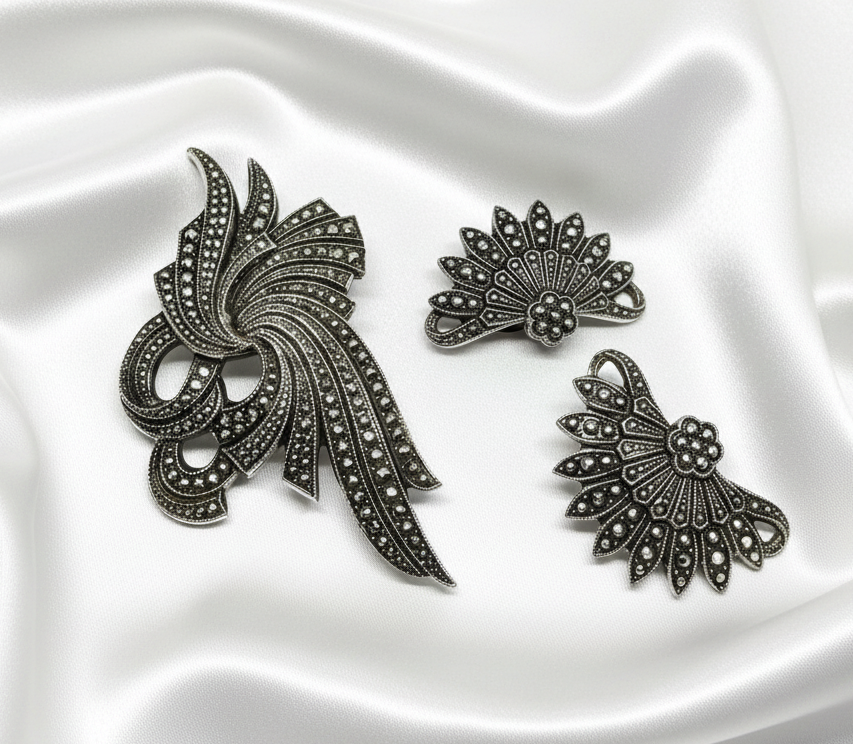 Marcasite set on white satin background