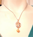 Silvertone Floral Pendant with Rhinestones and Simulated Antique Pearl with Necklace