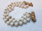 Stunning 1940s, Early 1950s Triple Strand White Beaded Faux Pearl Bracelet with Stunning Gold accents, Mid Century Modern