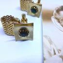 Gorgeous, Gold Tone Buckle Cuff Links with Emerald Stone