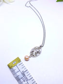 Silvertone Floral Pendant with Rhinestones and Simulated Antique Pearl with Necklace