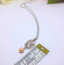 Silvertone Floral Pendant with Rhinestones and Simulated Antique Pearl with Necklace