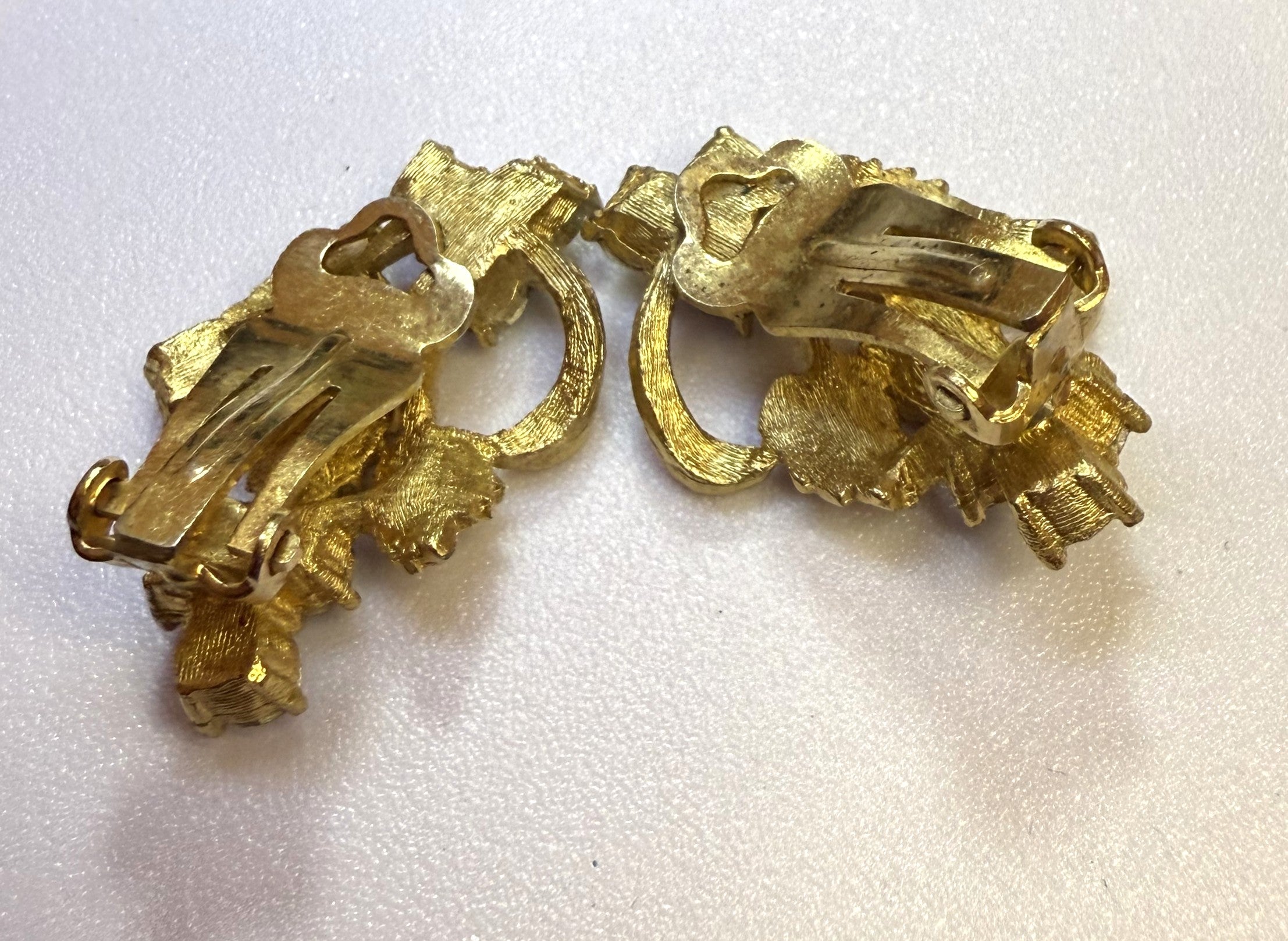 1940s Gold Tone Leaf Clip-On Earrings  with Purple Aurora Borealis Stones