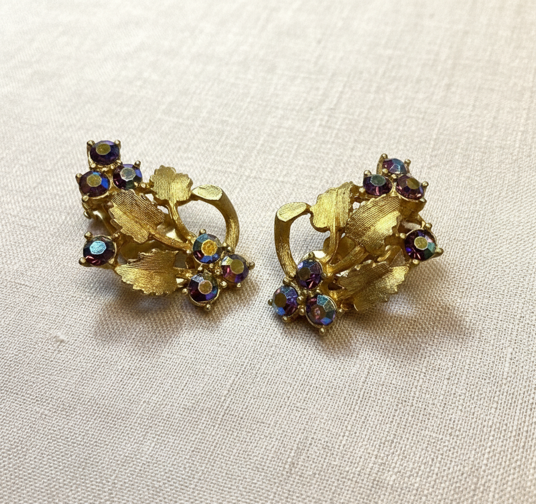 Light fabric background for vintage earrings